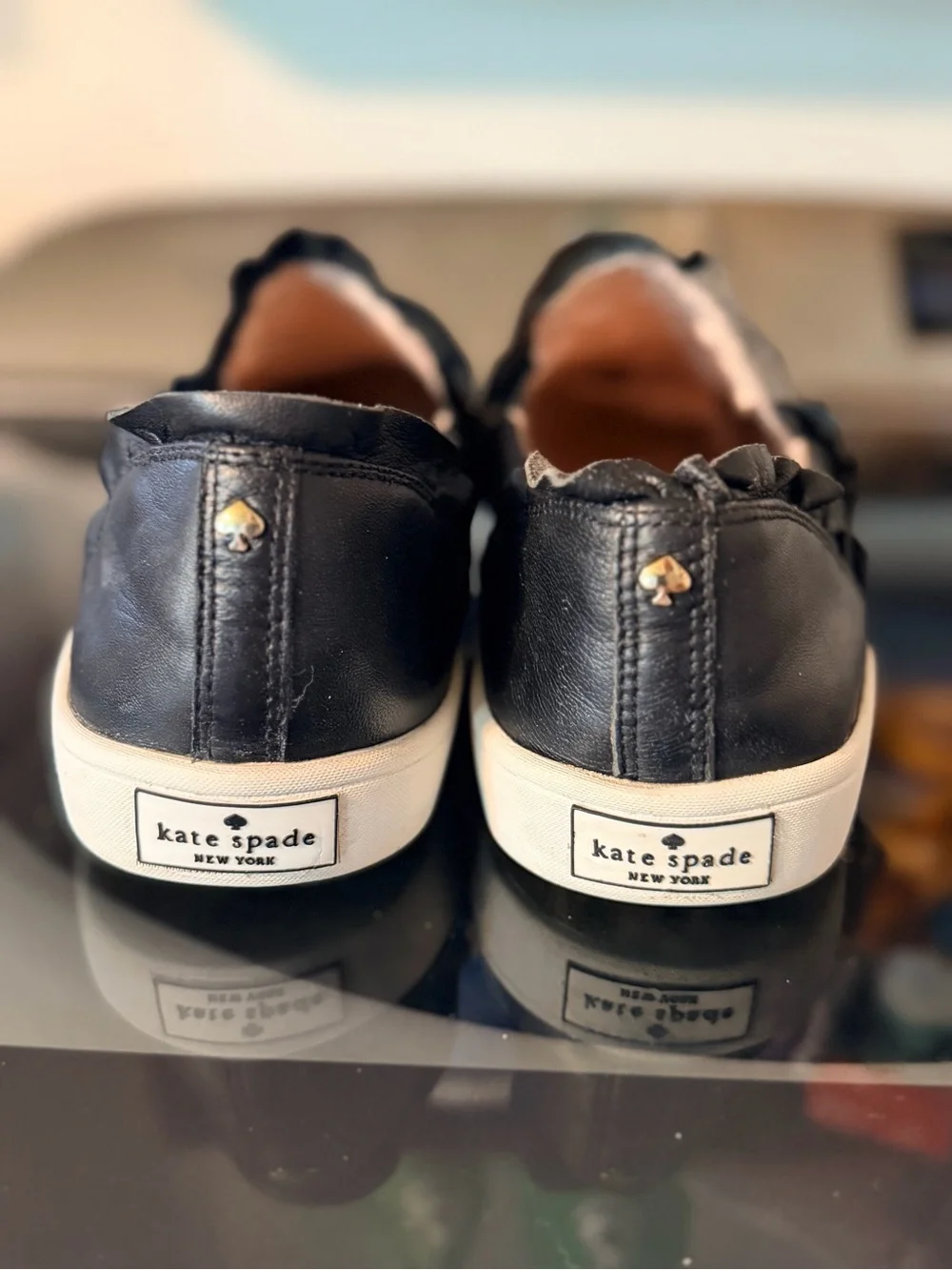 Like new Kate Spade New York Black LeatherSlip On Sneakers women’s size 9.5